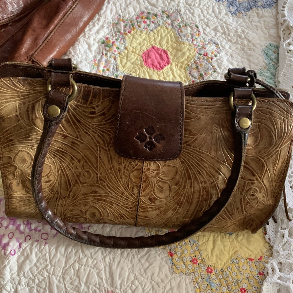 Tooled leather handbag